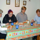 Gathered around the dinner table, the Bladners enjoy not catching up on the day's events.